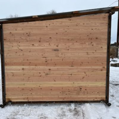 Alternate side view of a Winter mobile livestock shelter